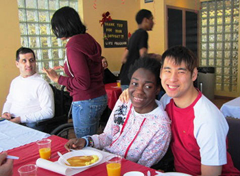 Smiling participants having lunch 